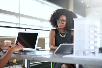 Lady typing on her laptop 